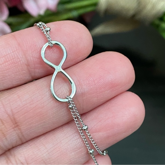 Silver-tone Dainty Infinity Bracelet - Picture 4 of 9